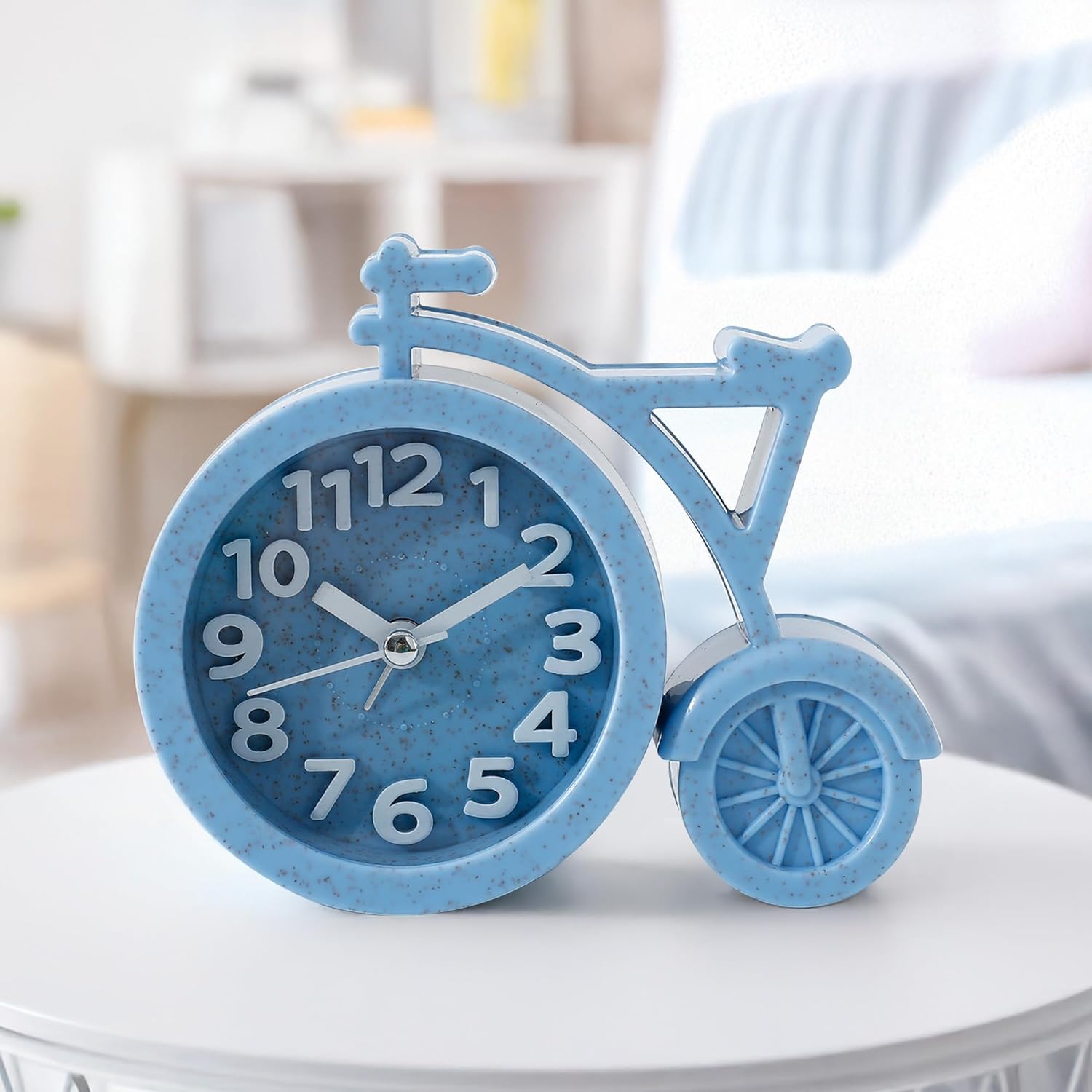 The Better Home Analog Alarm Clock (13.5cm) | Loud Clock for Heavy Sleepers | Mini Clock for Kids | Cycle Shaped Table Clock for Study Table and Bedroom – Blue, Plastic The Better Home Analog Alarm Clock (13.5cm) | Loud Clock for Heavy Sleepers | Mini Clock for Kids | Cycle Shaped Table Clock for Study Table and Bedroom – Blue, Plastic