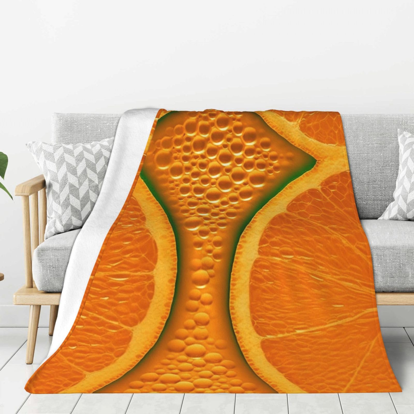 Couverture polaire flanelle douce orange : fini le froid sur le canapé