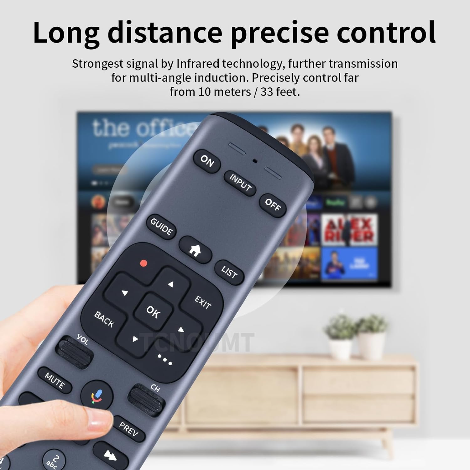 Hand holding the RC82V remote, with a TV screen in the background, illustrating long-distance control.