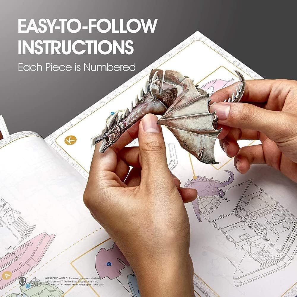 Hands holding a puzzle piece with instructions visible.