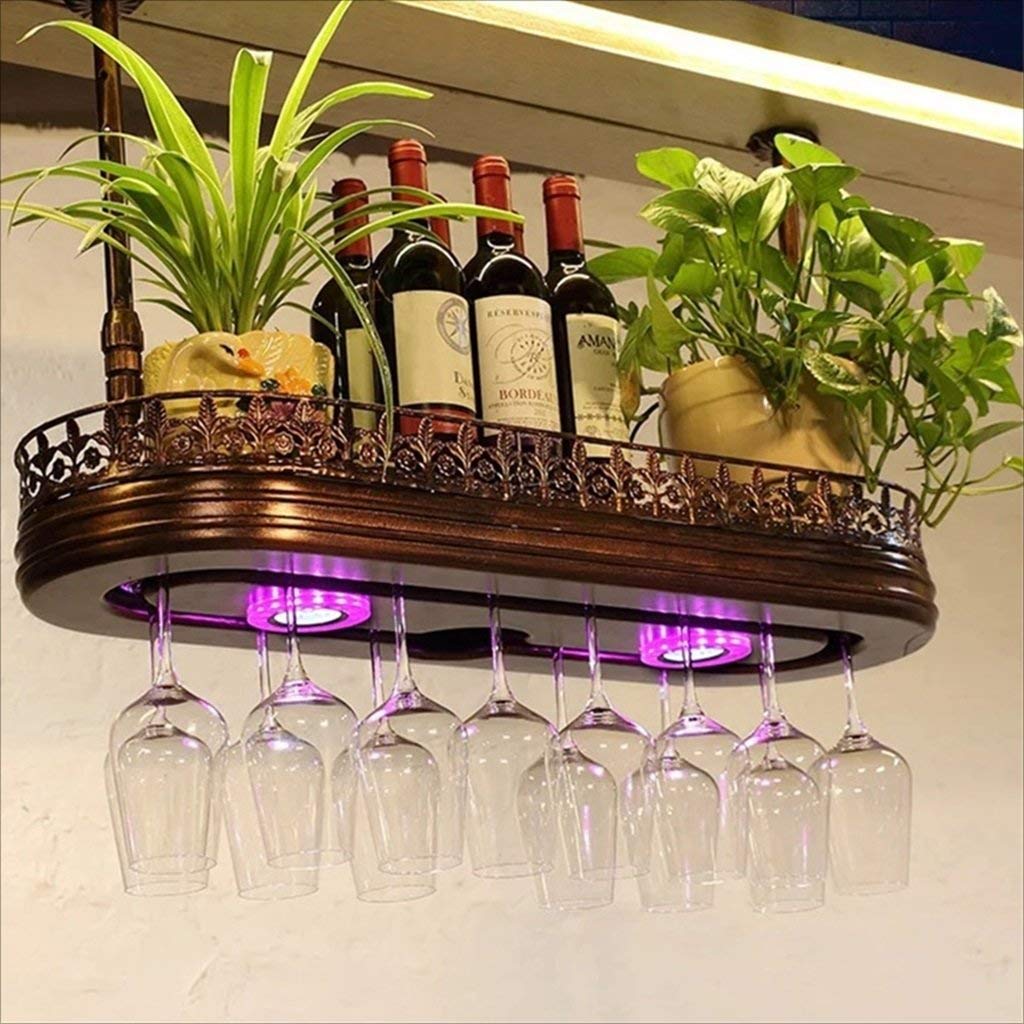 Estantes de vino para colgar copas boca abajo en mostradores de bar y muebles de hostelería