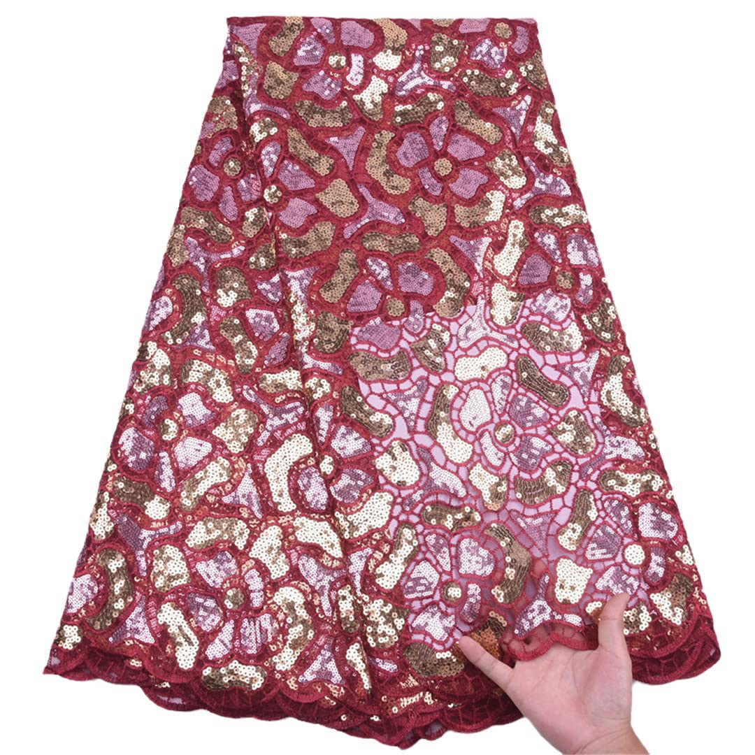Tessuto Tulle - pizzo mano seta ricamato con pietre e con paillettes motivo astratto nero