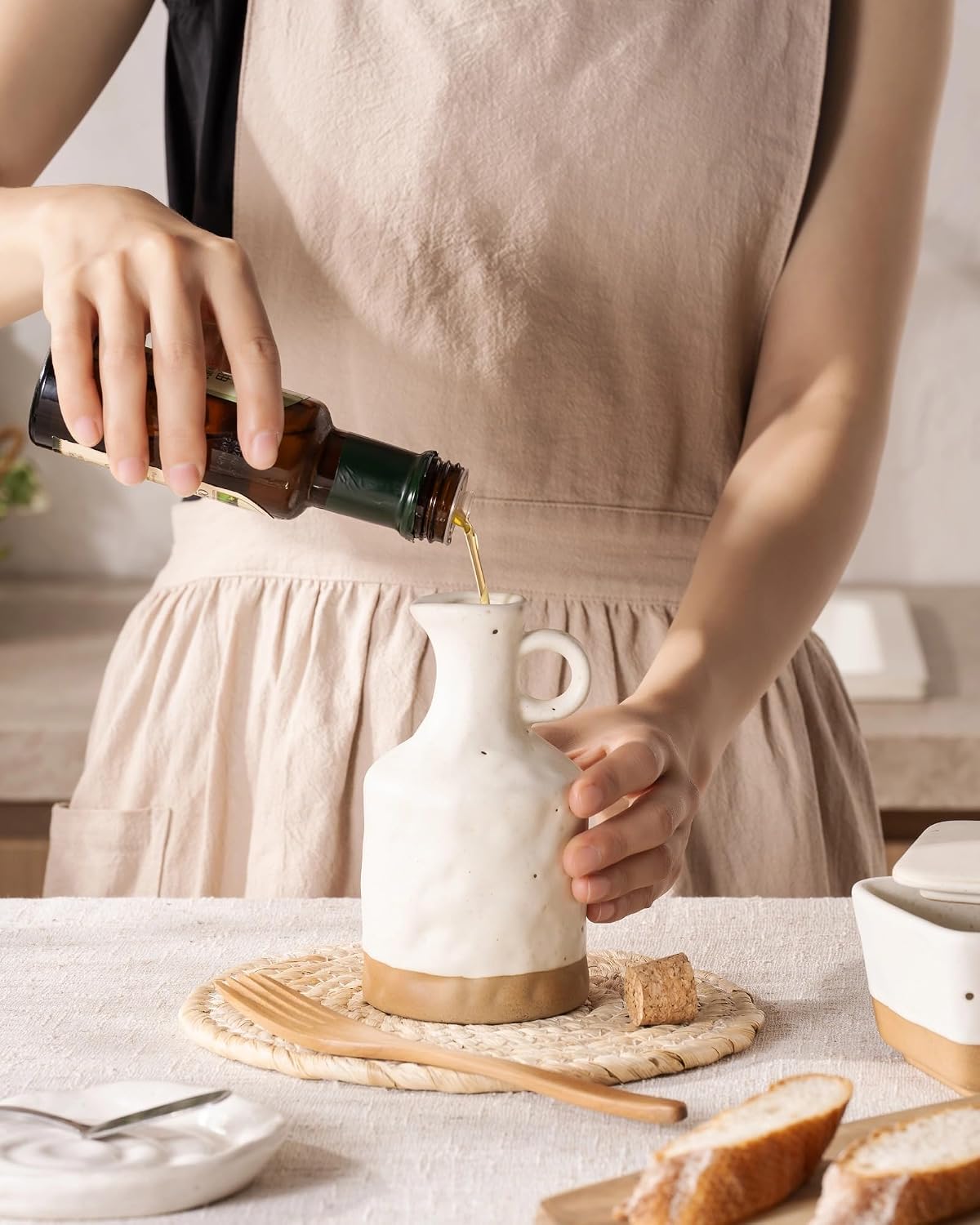 Besmeety 10 oz Olive Oil Dispenser Bottle with Cork Stopper and Handle, Ceramic Oil Bottles for Kitchen, Soy Sauce Dispenser, Leakproof, Opaque Cruet Protects to Reduce Oxidation(White)