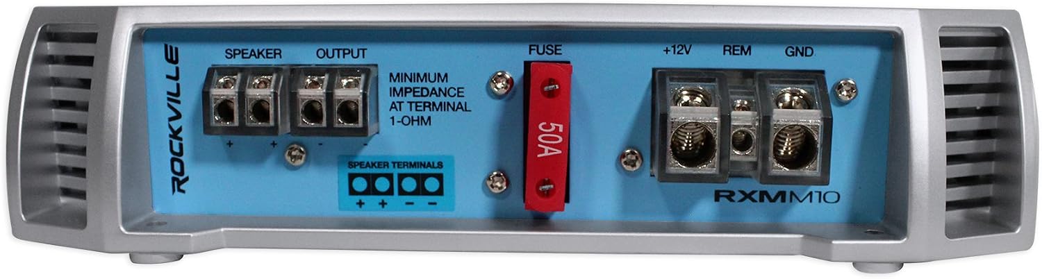Rear view of the Rockville RXM-M10 amplifier showing power, ground, remote, and speaker terminals. A 50A fuse is also visible.