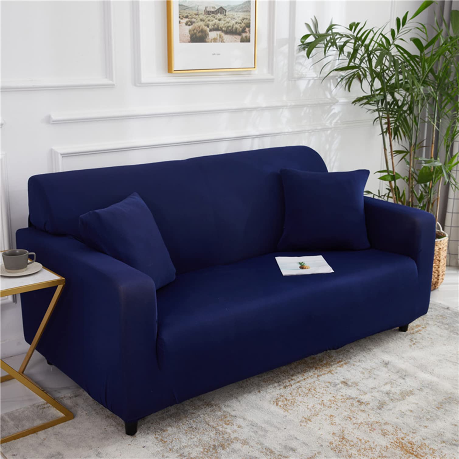 Housse de canapé extensible bleu foncé idéale pour rénover un fauteuil
