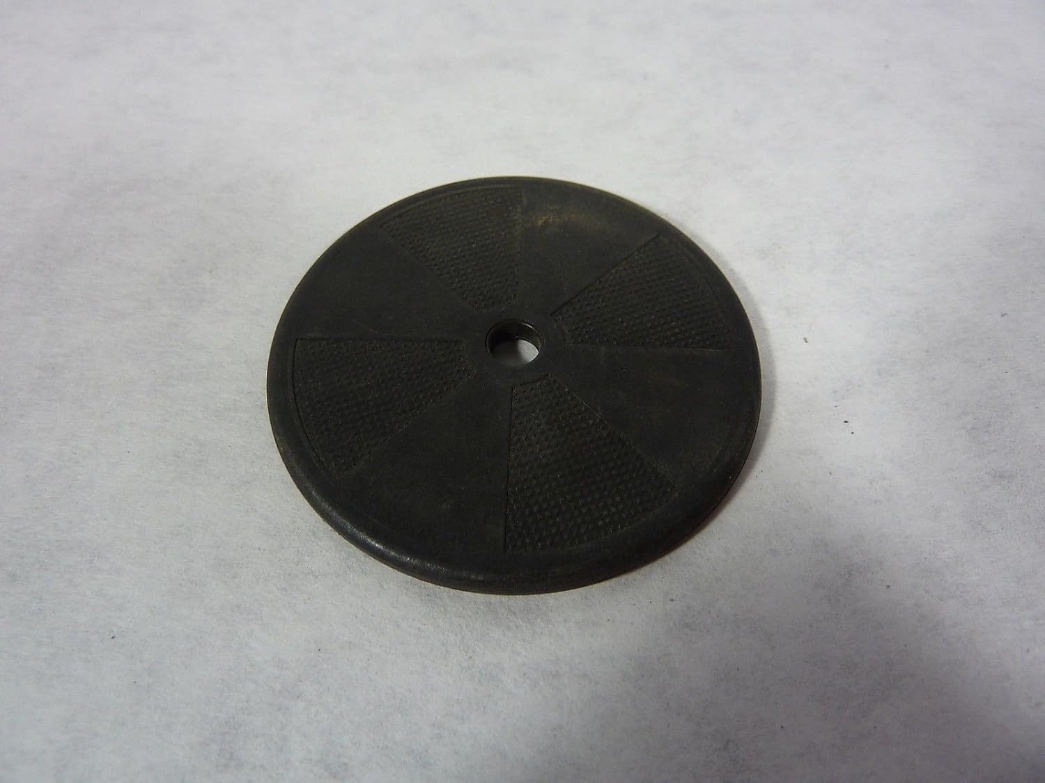 മുകളിൽ view of the TURCK TW-R50-B128 data carrier, showing its circular shape and a central mounting hole.