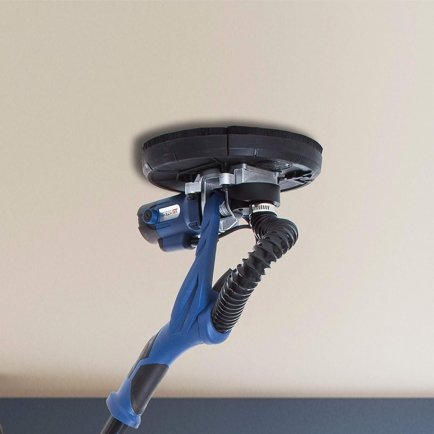 DEXTER 710W Drywall Sander in use on a ceiling