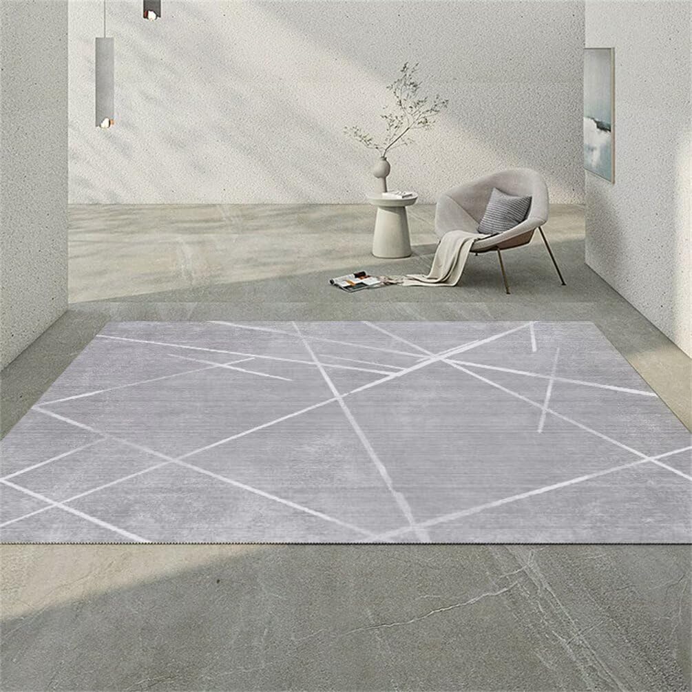 Tapis moderne à rayures grises texture ultra moelleuse format compact 50x80cm