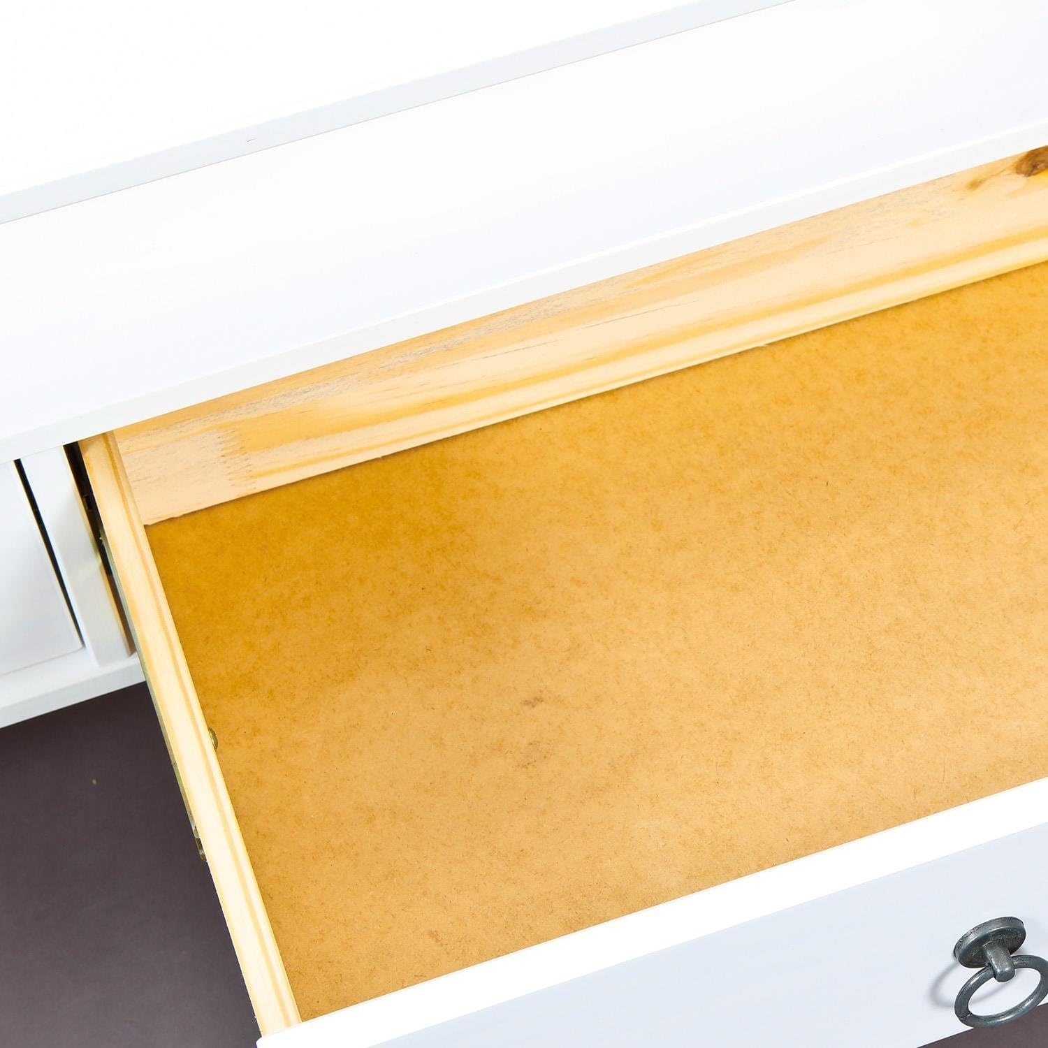 Interior view of an open drawer on the coffee table