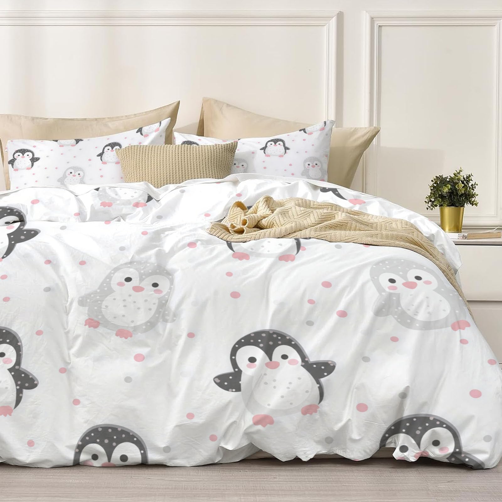 Des pingouins mignons et joueurs sur une housse douce de dimensions 200x200
