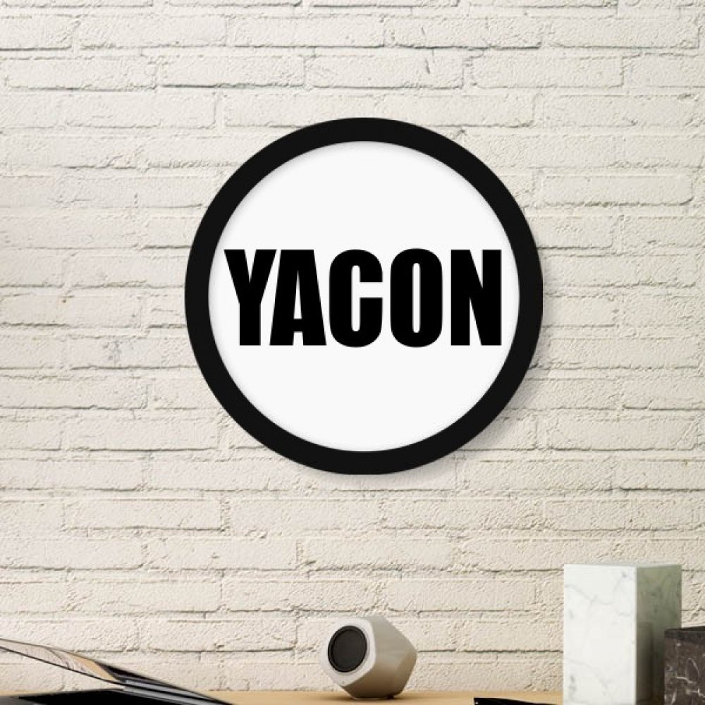 Peinture nom art yacon fruit dans son cadre photo ronde en bois noir pour salon moderne
