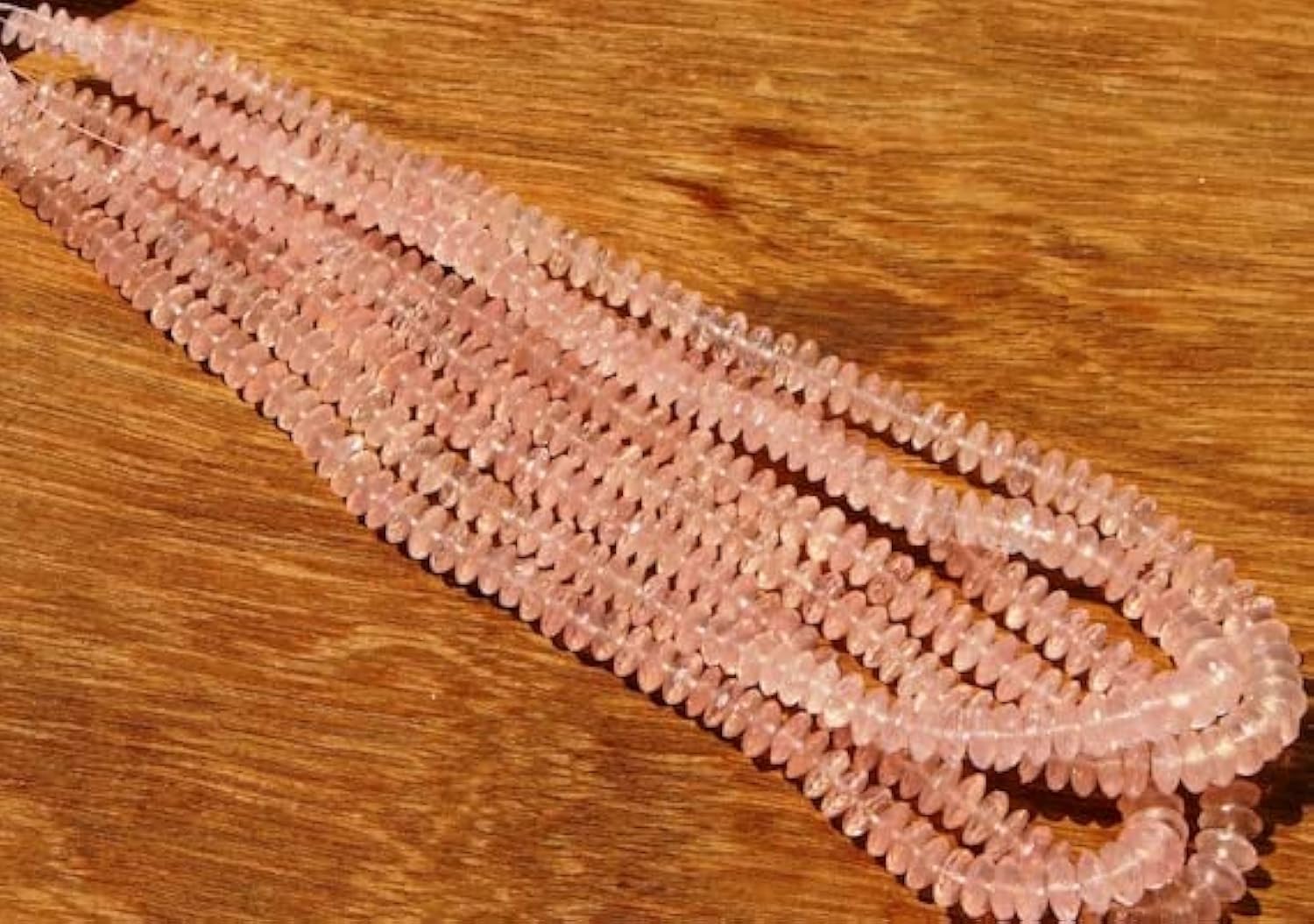 Perles quartz rose facettées 6x9 mm pour concevoir un cadeau unique