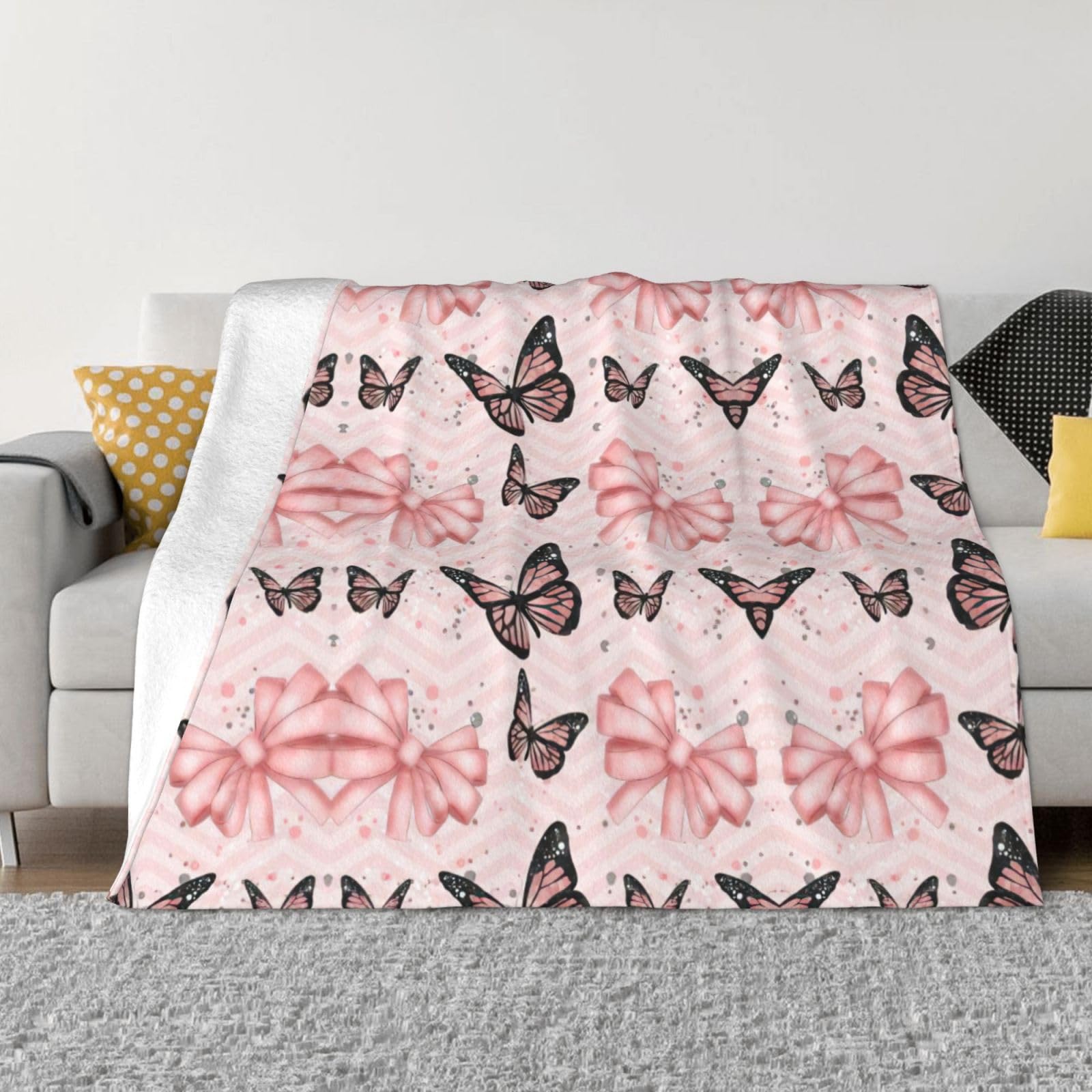 Couverture flanelle papillon rose : un nid de douceur et réconfort pour vos nuits