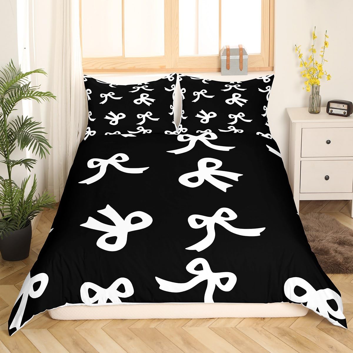 Housse de couette motif nœud papillon noir pour créer un cocon déco style chambre de princesse