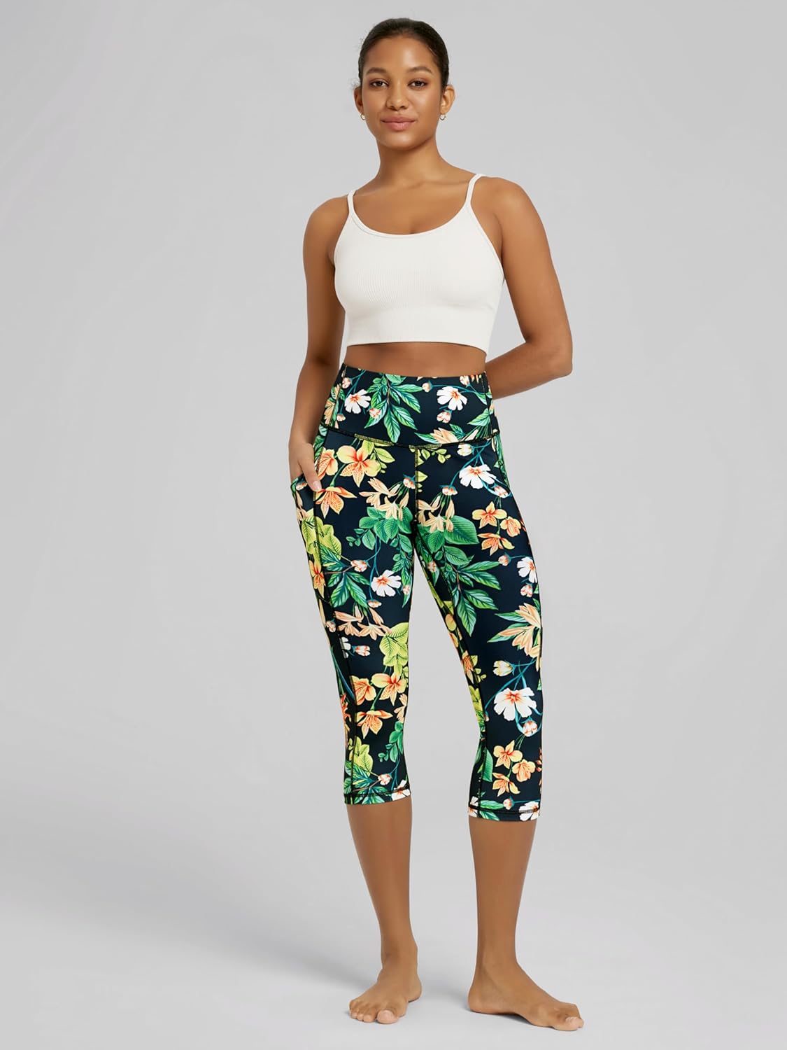 ODODOS Women's High Waisted Yoga Capris with Pockets, Tummy Control Non See Through Workout Athletic Running Capri Leggings