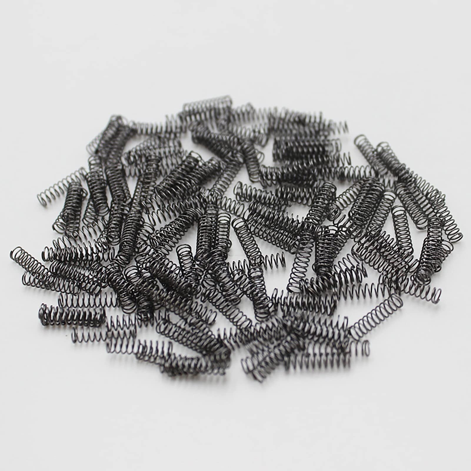 Kompresja buforowa 1,4 x 18 mm sprężyny naciskowe, 1,4 mm średnica drutu x 18 mm średnica zewnętrzna x (10-50) mm wolna długość, sprężyna przedłużająca ze stali sprężynowej, 10 sztuk ładowanych
