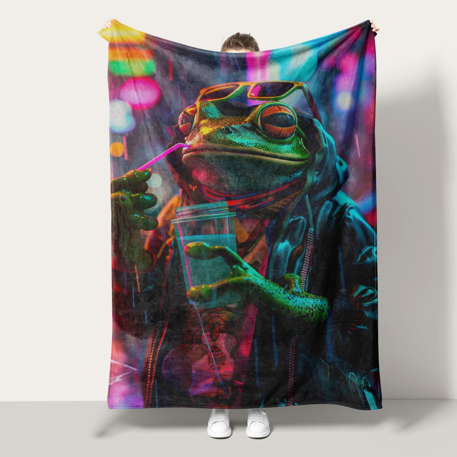 Couverture grenouille flanelle pour des moments cocooning sur le canapé