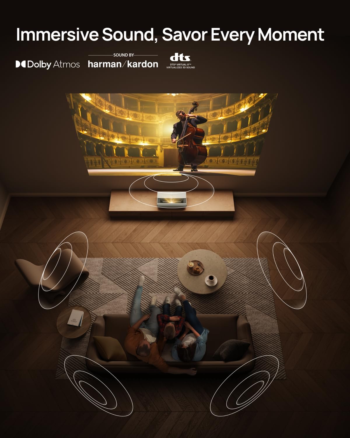 เสาอากาศ view of a living room with the XGIMI AURA 2 GTV projector, showing sound waves emanating from it, indicating immersive audio from Harman Kardon and Dolby Atmos.