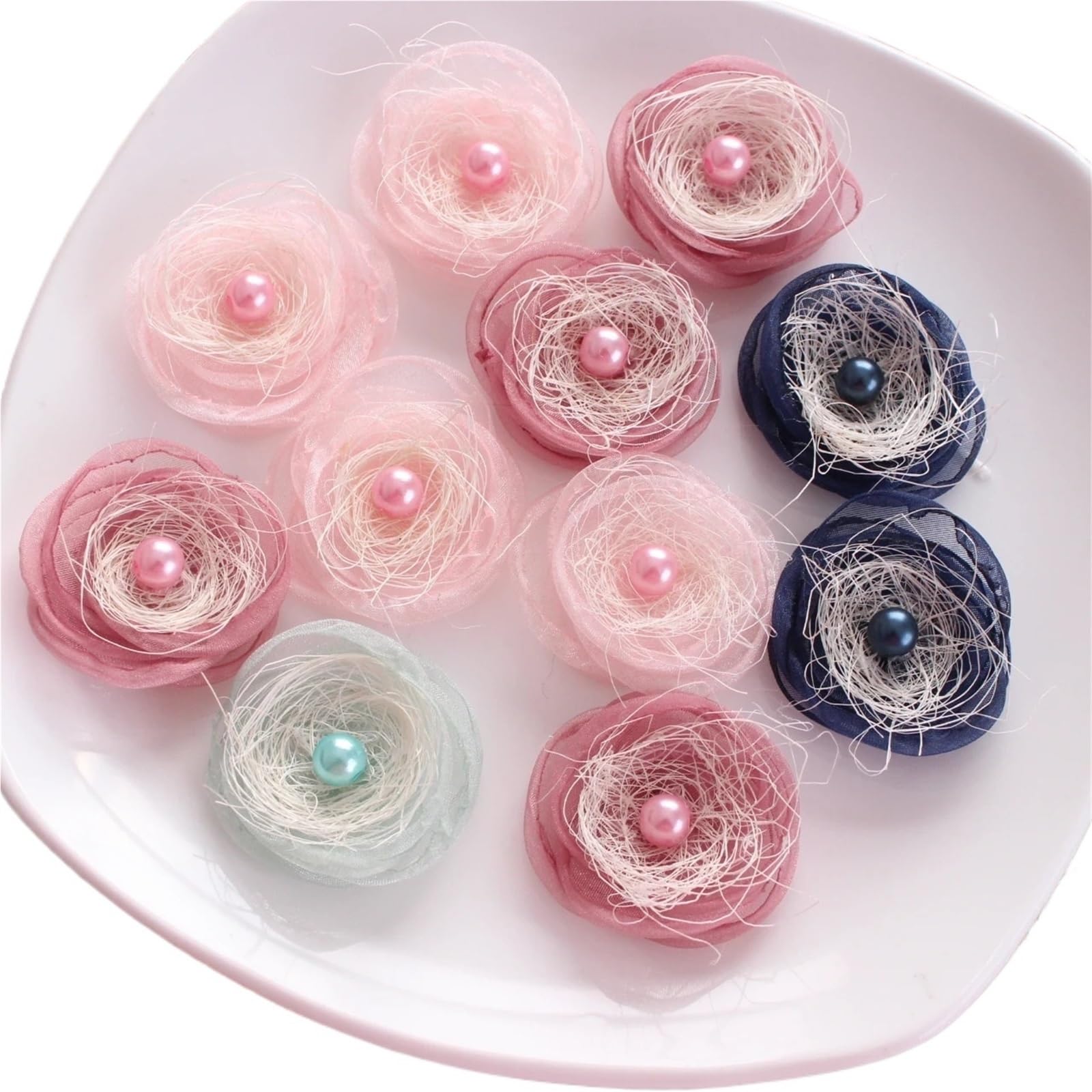 Fleur en tissu brûlé pour cheveux fille : accessoire artisanal élégant