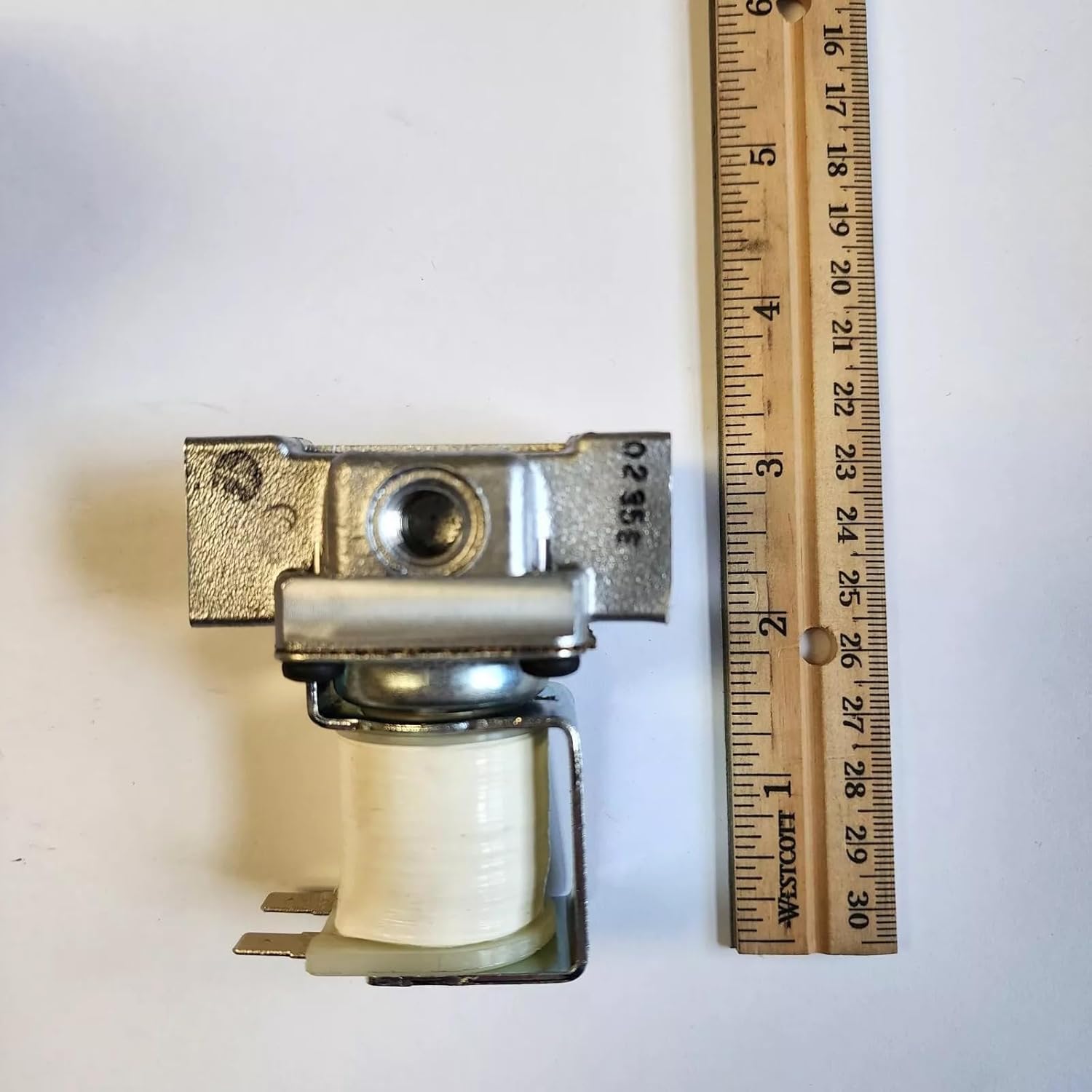 Top view of the 4075-029 Gas Solenoid Valve next to a ruler for scale.
