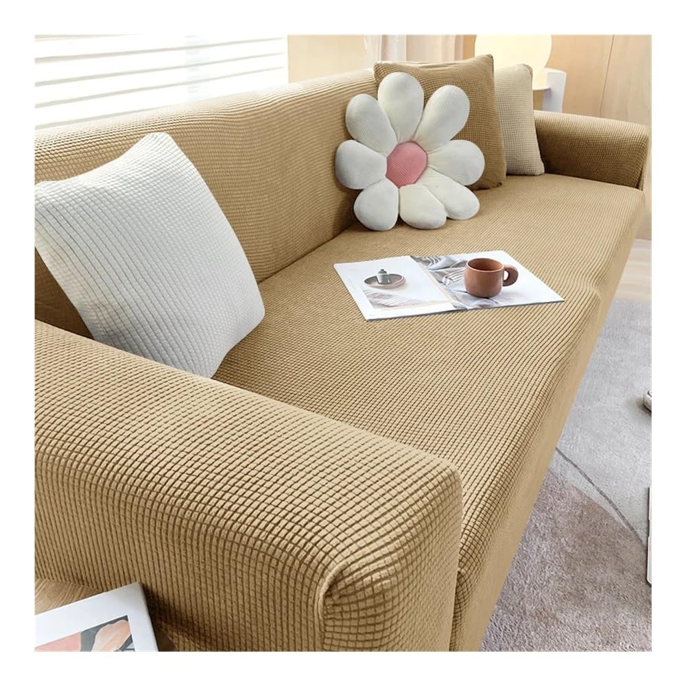 Housse de canapé élastique kaki pour rénover un fauteuil abîmé de salon