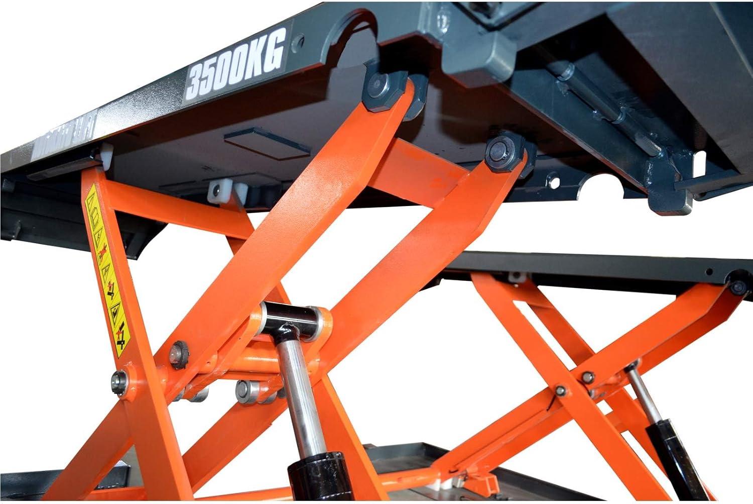 A car raised on the KATOOL X80-110 Mid-Rise Scissor Lift in a garage setting