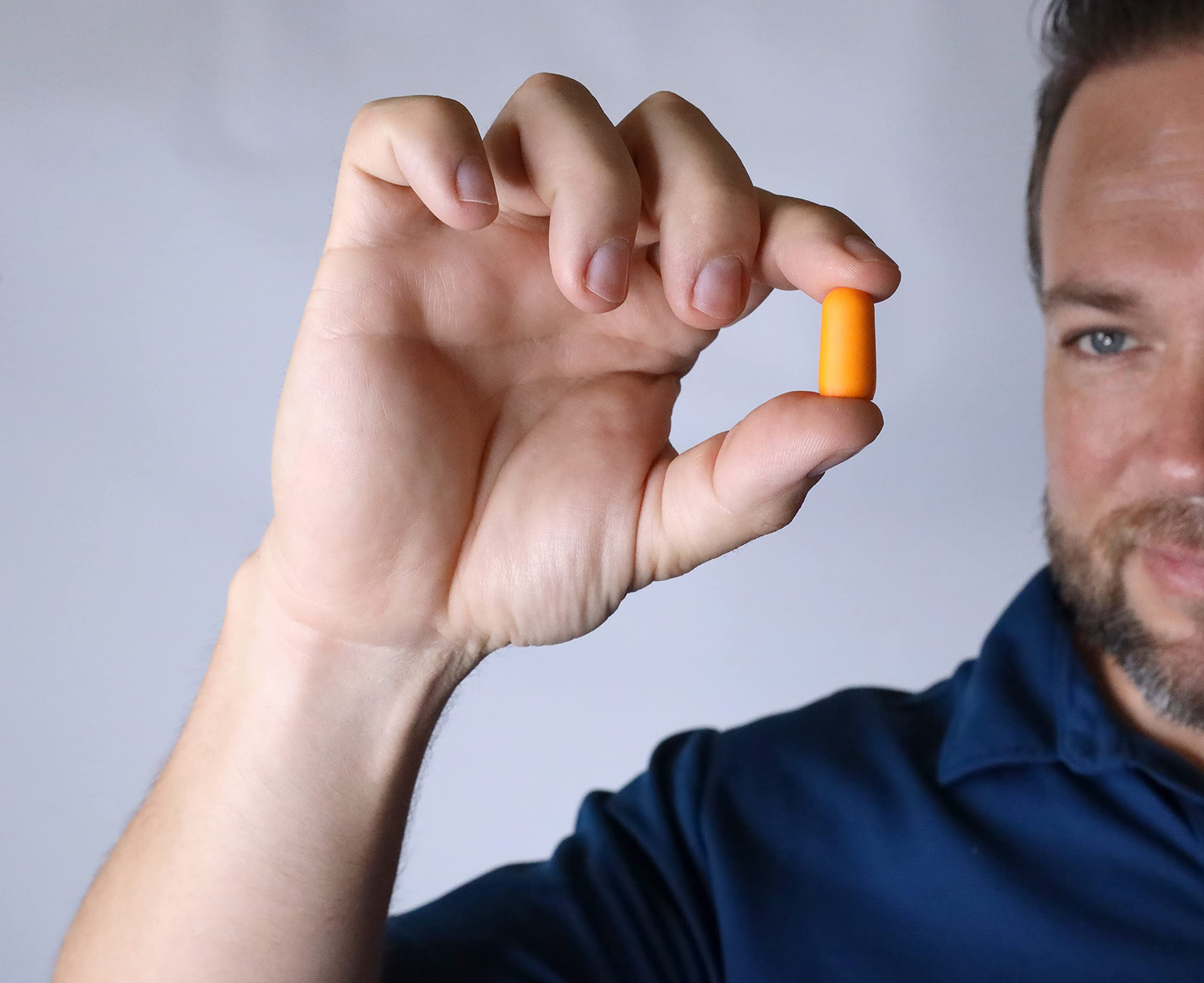 50 pares de tapones de espuma para los oídos de 32 dB suaves para dormir, viajes, música fuerte, concierto, caza, estudio, trabajo, construcción, protección auditiva (naranja)