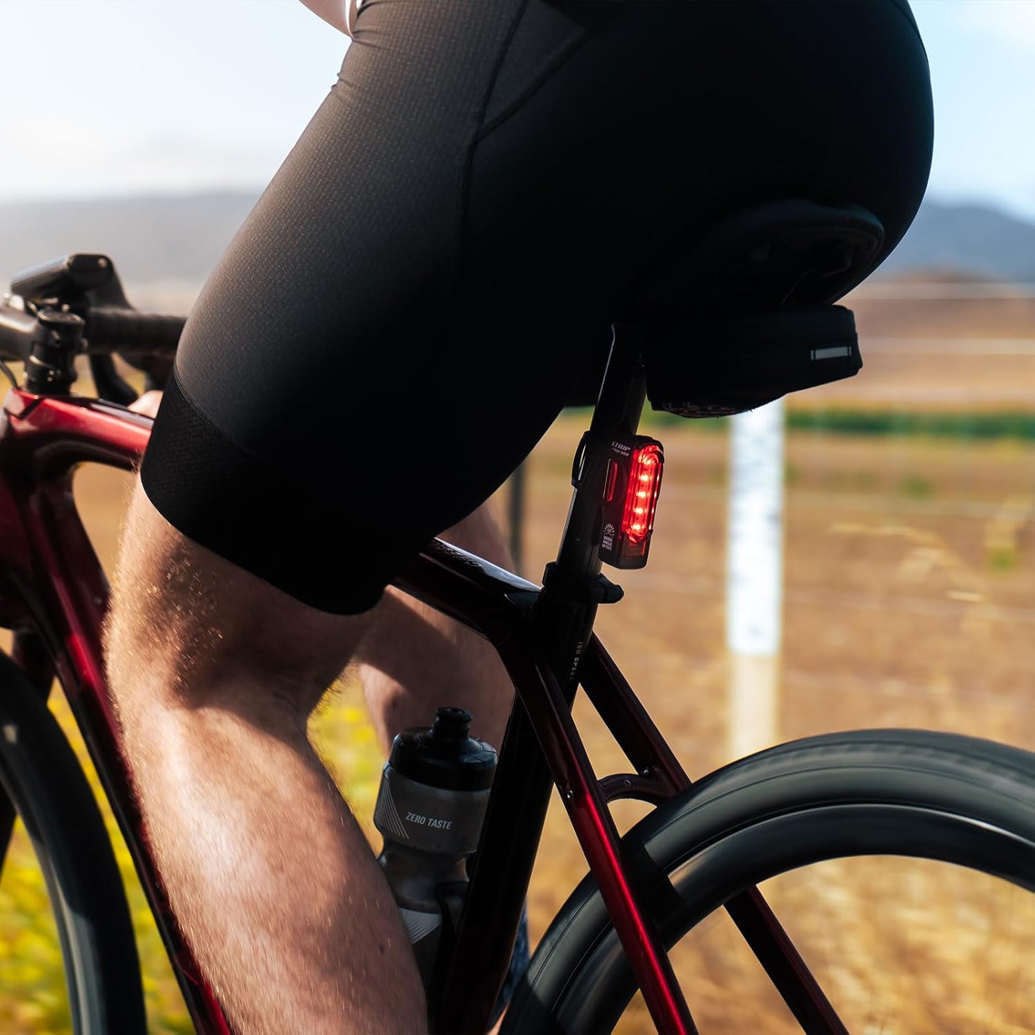 LEZYNE Strip Drive Bicycle USB Rechargeable IPX7 Waterproof Red LED Rear Light w/Multiple Solid & Flash Modes | Silicone Rubber Mounting Strap Included - 150/300 Lumens Options