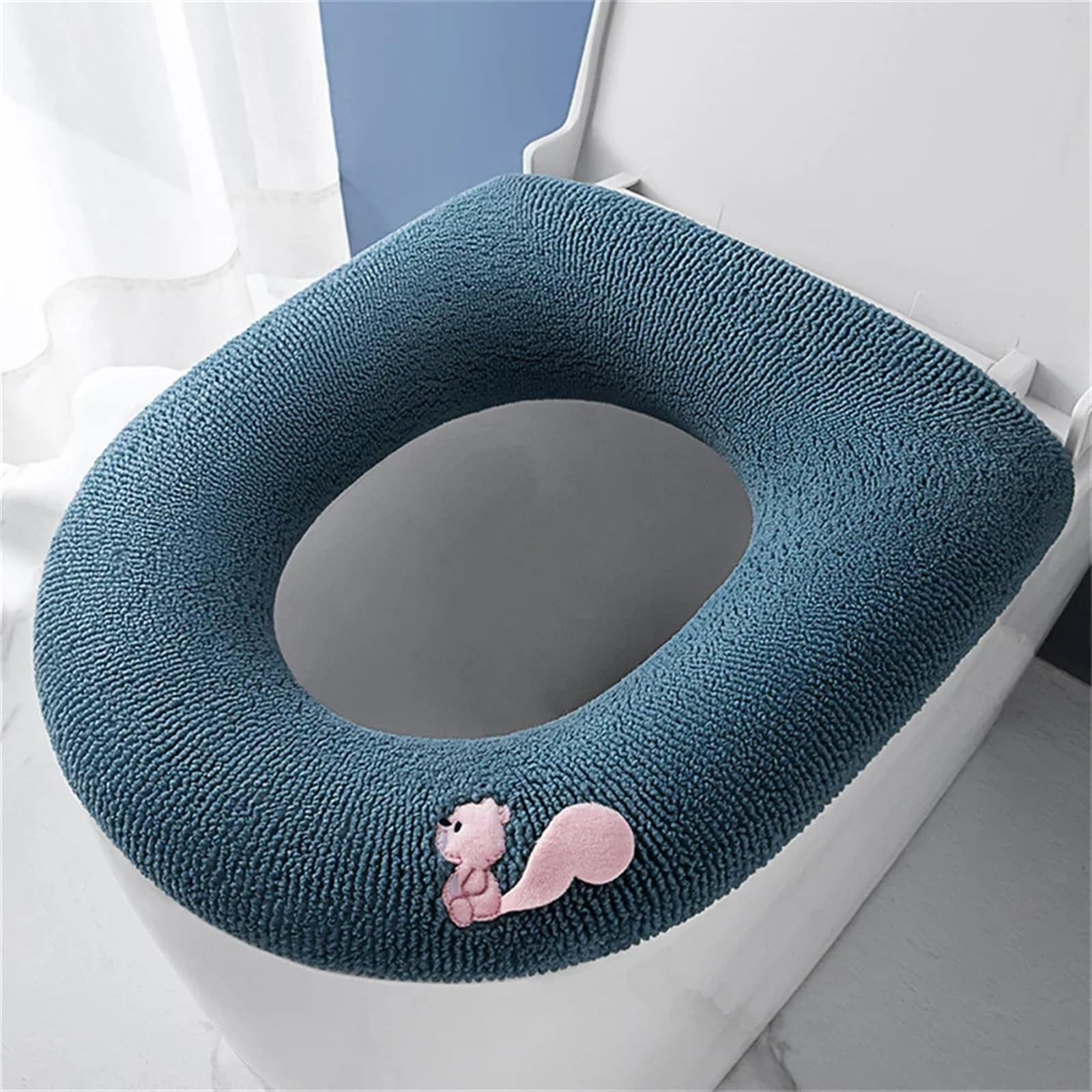 Coussin de siège de toilette chaud pour une salle de bains cosy en hiver