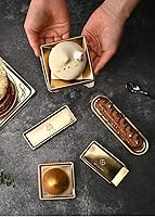 Vista 1 de Mini tableros cuadrados para tartas de 2.6 pulgadas, 100 piezas, cartón desechable de mousse dorado con base recubierta a prueba de grasa, perfecto