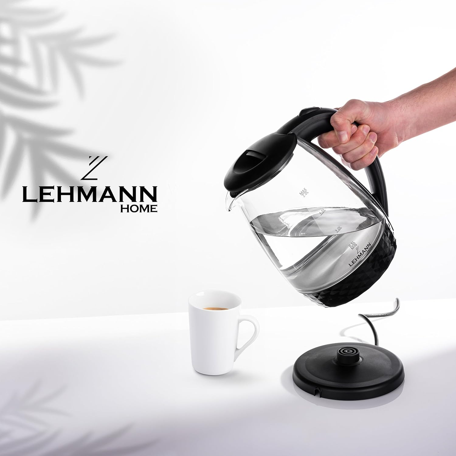 Lehmann LHOEK-2220C kettle pouring hot water into a white mug.