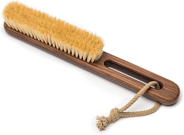 Vegan clothing brush from Steamery, ideal for pet owners. Acts as a dog hair remover and removes lint