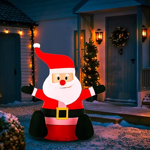 Inflatable santa shown next to a house, golf cart decoration