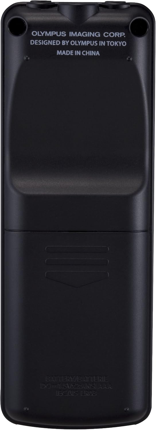 Right side view of the OLYMPUS Voice-Trek VN-7300 IC Recorder, showing the record button and other controls.