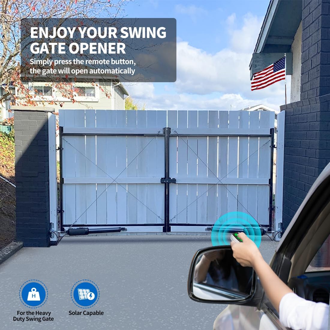 Person using a remote control to open a dual swing gate from inside a car.