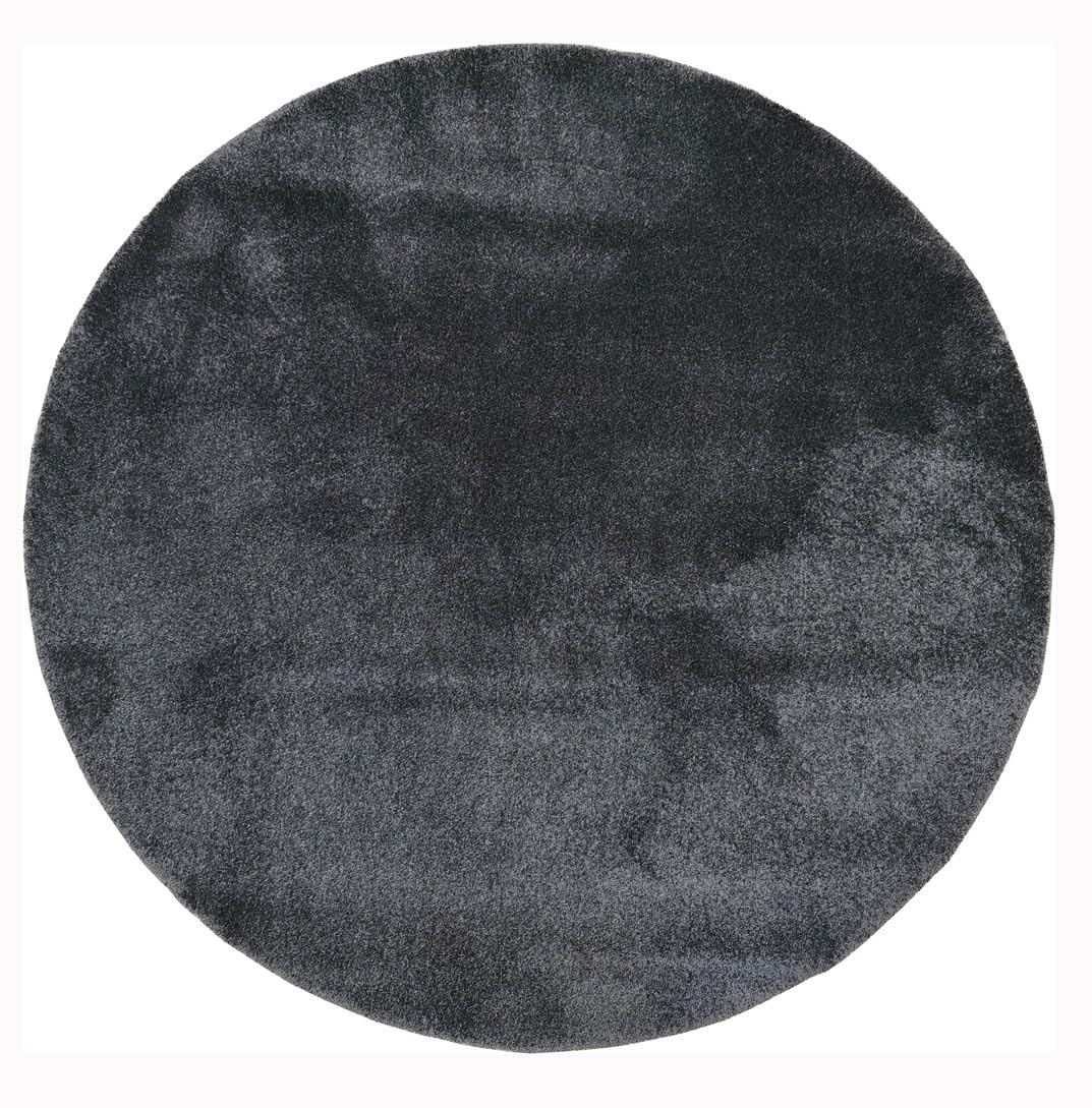 Tapis rond uni gris pour réchauffer un petit salon au sol trop froid