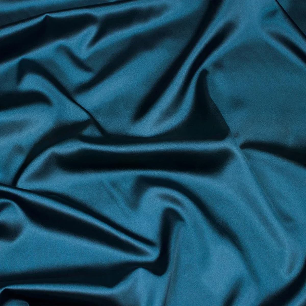 Tissu mercerisé en soie bleu encre pour fond photographique de cosmétiques
