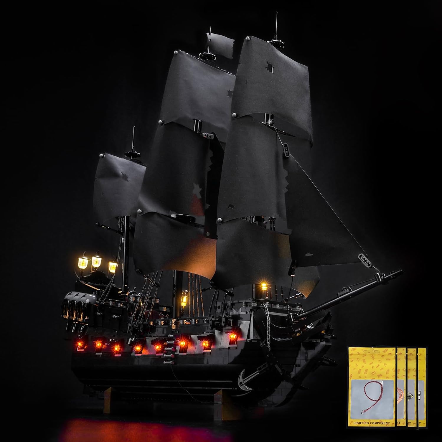 Close-up of the stern of the LEGO Pirate Ship, showing three warm yellow lanterns and interior lighting through windows.