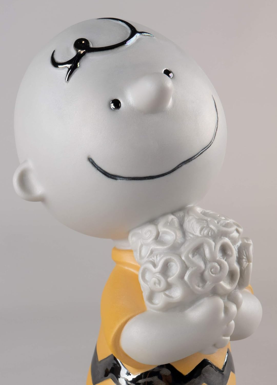 LLADRÓ Charlie Brown Figurine. Porcelain Charlie Brown (Snoopy) Figure.