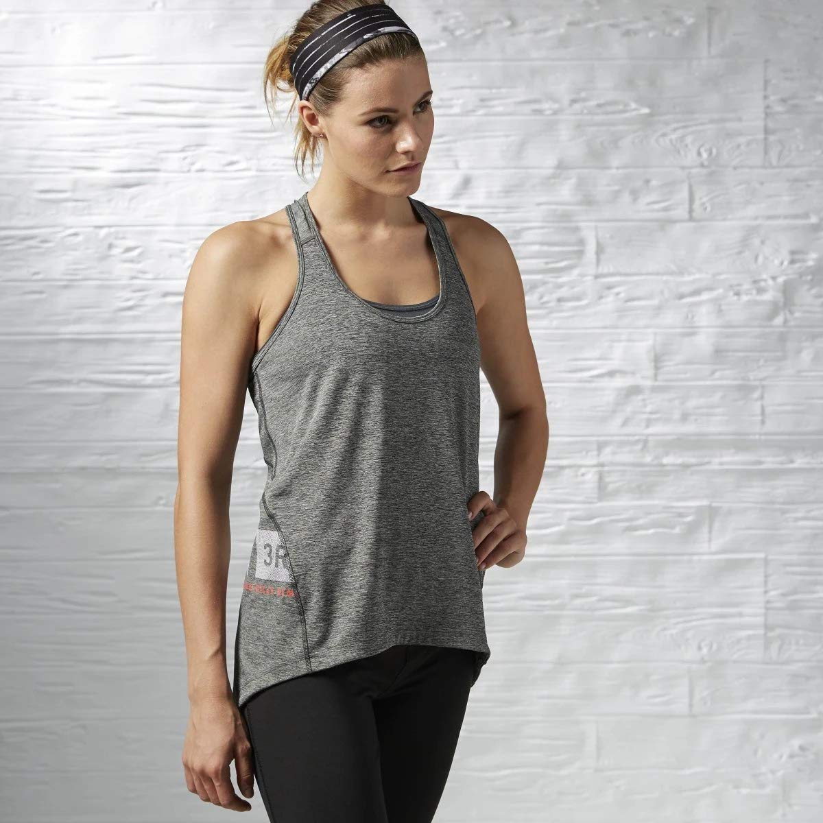 Reebok - Camiseta sin Mangas para Mujer