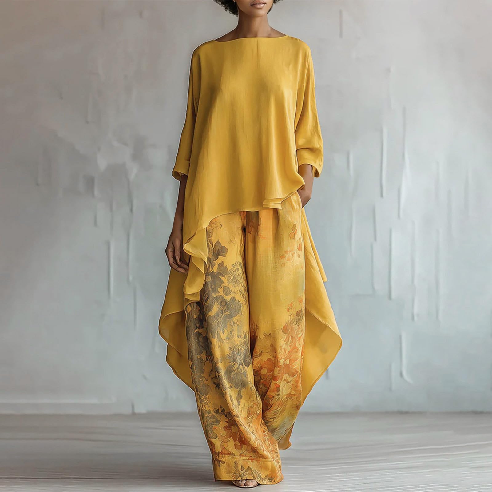 Pantaloni Arrival con Gamba Larga e vestibilità Comoda, abbinati a Una Maglia Corta Davanti e Lunga Dietro, Perfetti per Tutti i Giorni.