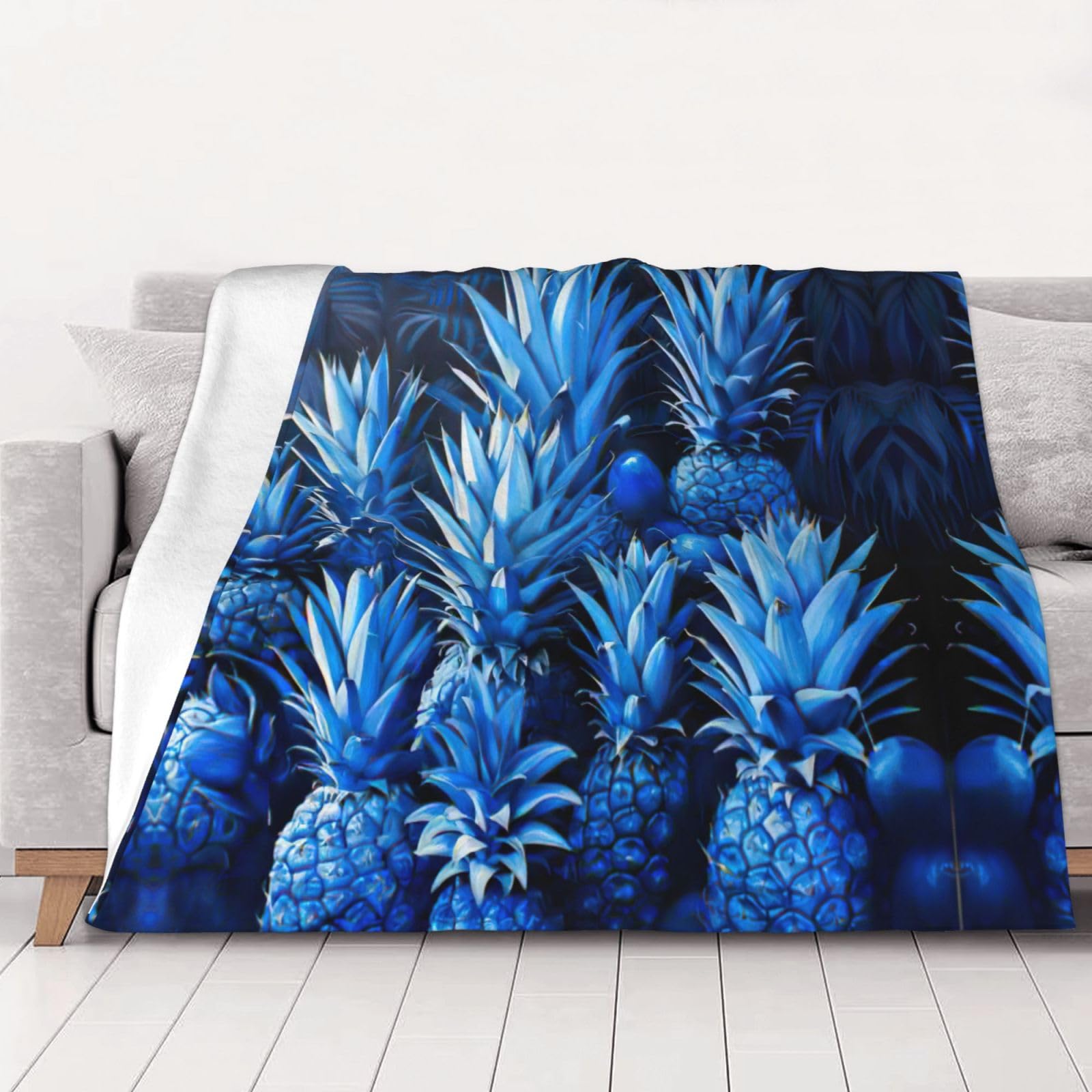 Couverture flanelle ananas bleu pour stopper le froid sur le canapé ou le lit en toute saison