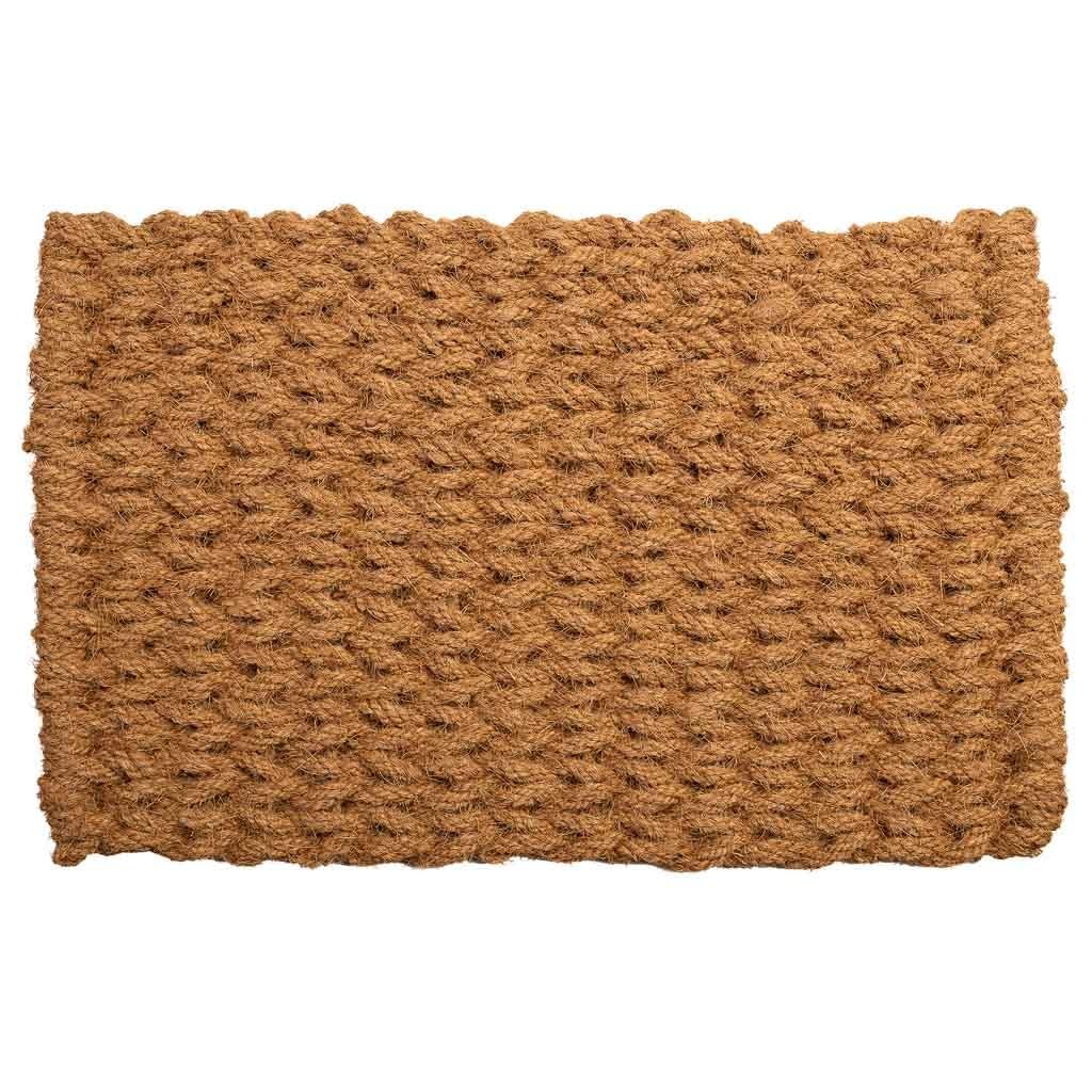 Paillasson en corde de coco marron idéal pour sublimer l'entrée de votre maison de campagne