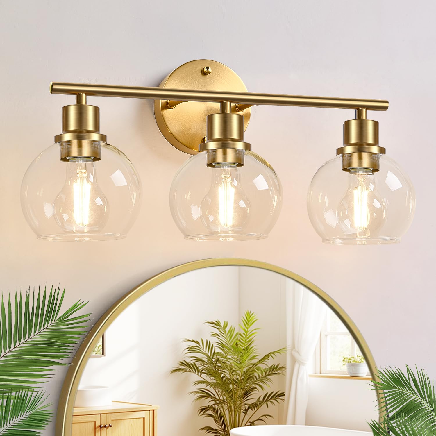 Photo 1 of Indoi 3-Light Bathroom Light Fixtures, Brushed Gold Modern Vanity Lights Over Mirror with Clear Glass Globe Shade, Bathroom Wall Sconces for Mirror Kitchen Living Room Hallway Cabinet Bedroom Porch