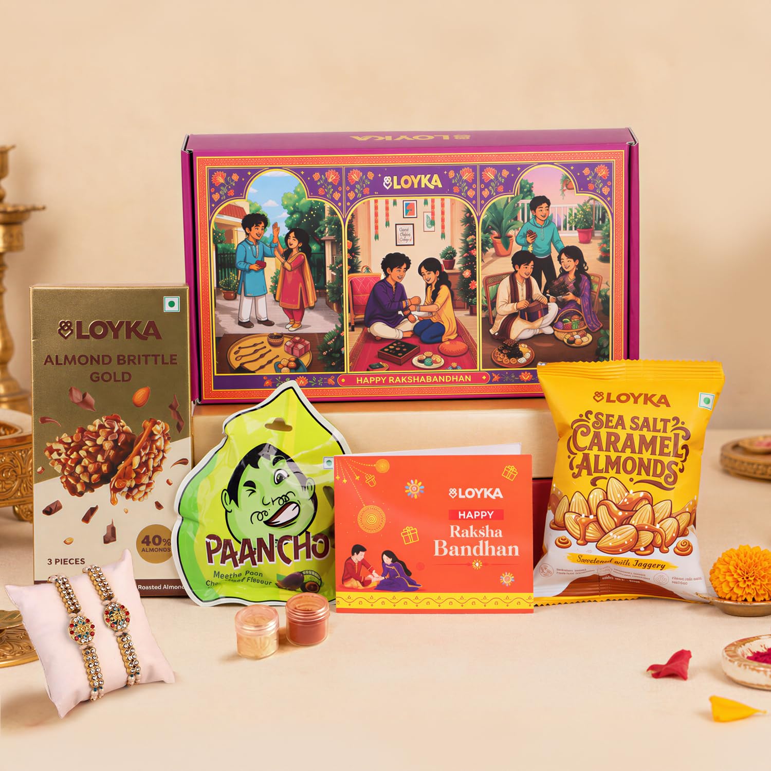 LOYKA Festive Aura Rakhi Gift Hamper for Brother & Sister -12 Inclusions - Premium Almond Brittle Gold, Caramel Almonds & Paancho Chocolate Sweets Combo - 2 Rakshabandhan Set with, Roli Chawal & Card