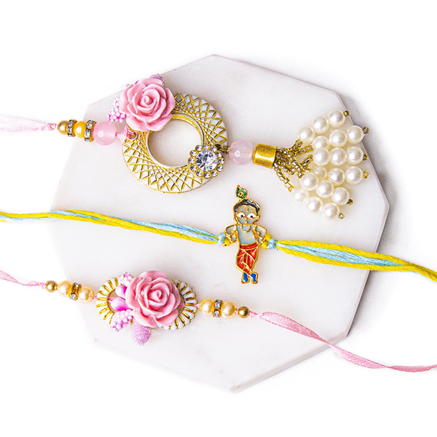 Kaameri Bazaar Krishna with Rose Flower Rakhi for Brother and Bhabhi and Kid - Rakhi for girls, boys with Roli Chawal Pack and Greeting Card Rakshabandhan Family Rakhi Set of 3 (B0DBZBKVHH) Amazon Price History, Amazon Price Tracker
