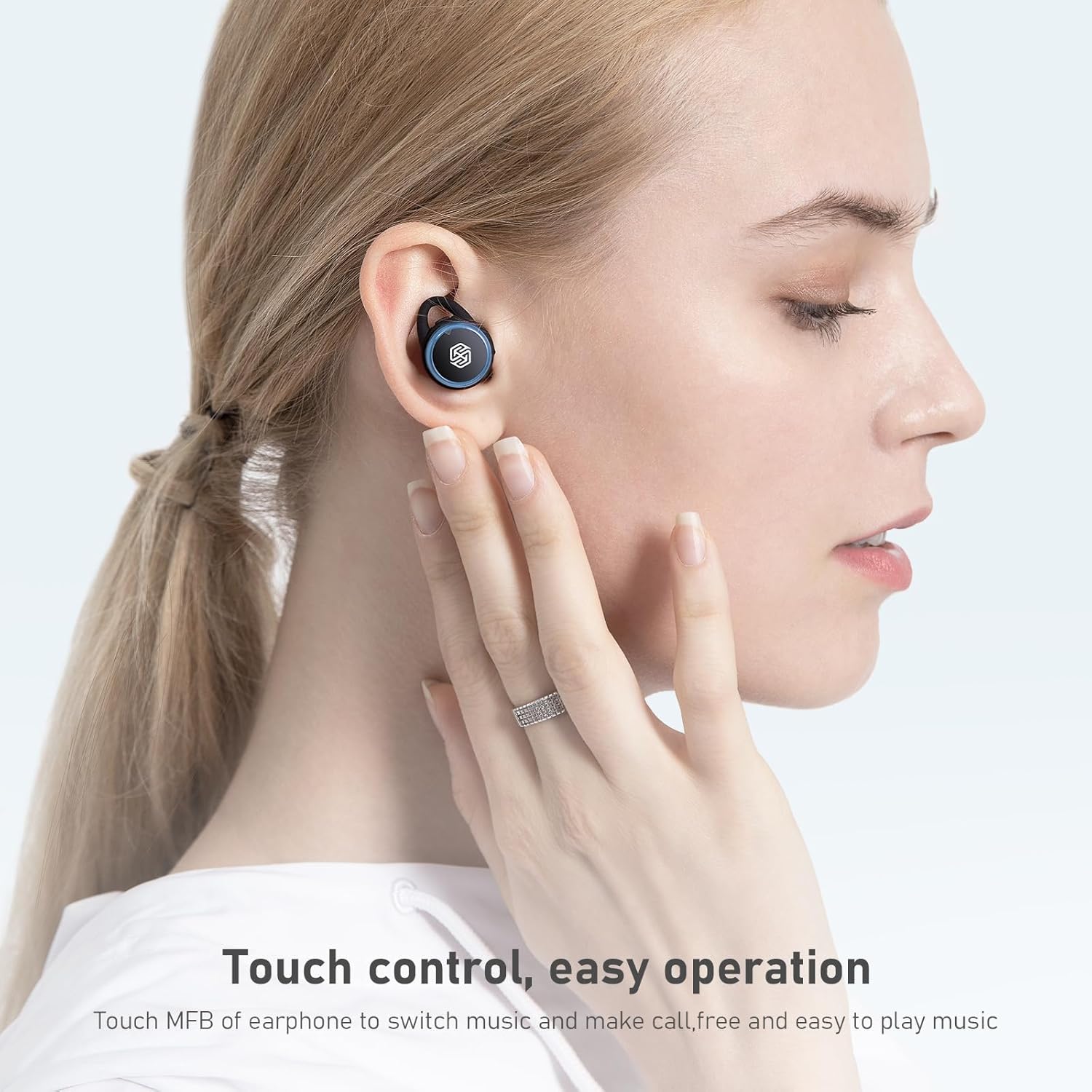 Hand touching Nillkin TW004 earbud for touch control