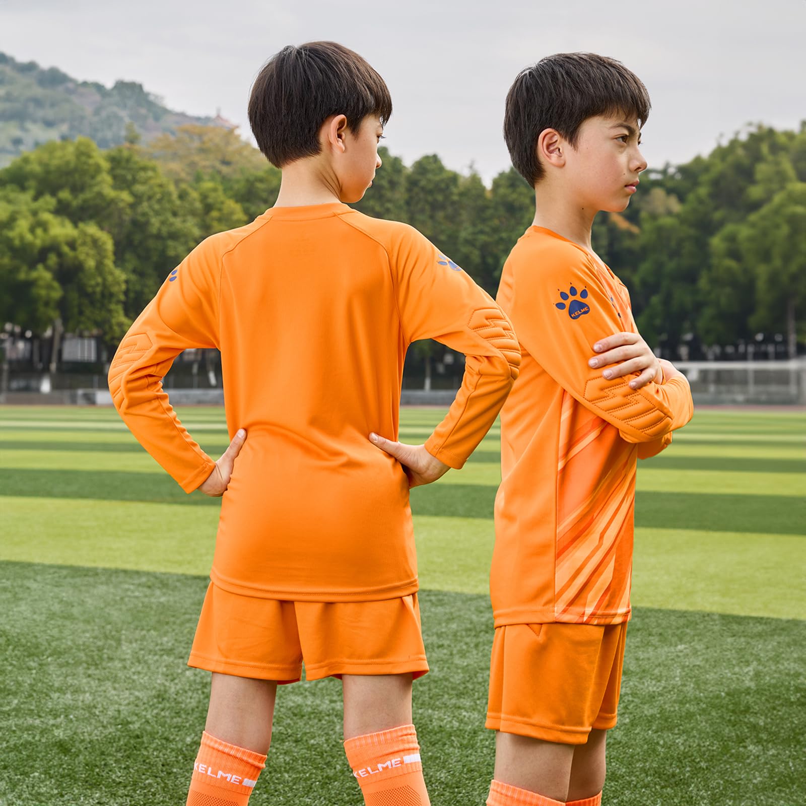KELME Camiseta de portero acolchada y corta para niños, camiseta de portero, uniforme de entrenamiento de césped de manga larga, juego de fútbol sal, juego de ropa naranja para niños 10