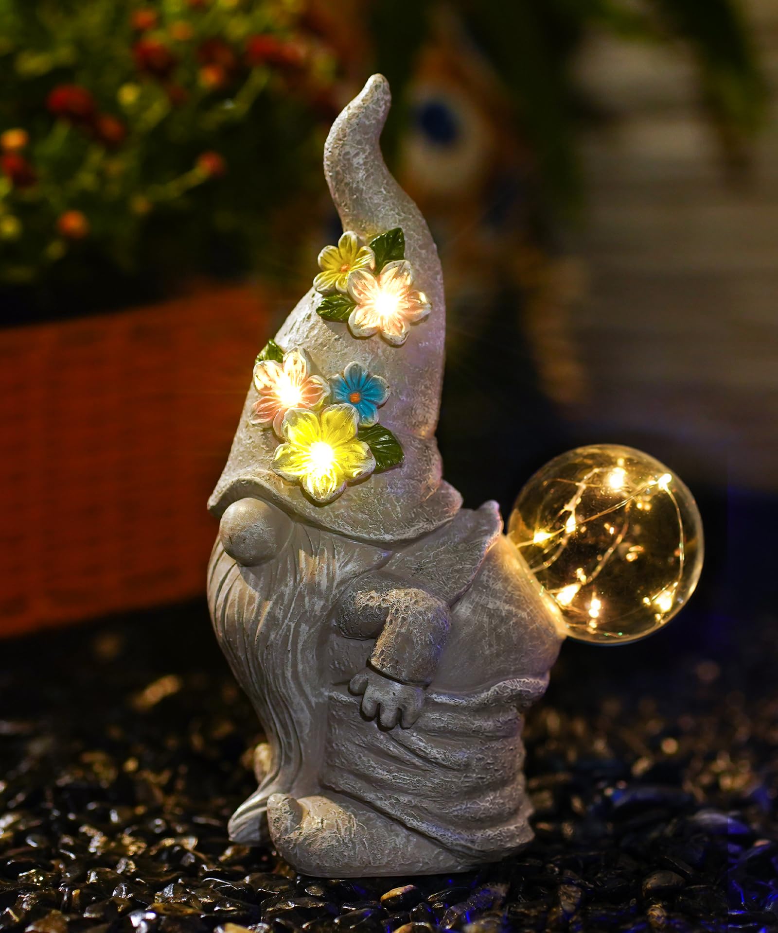 Nain de jardin solaire soufflant des bulles pour animer un extérieur trop sombre