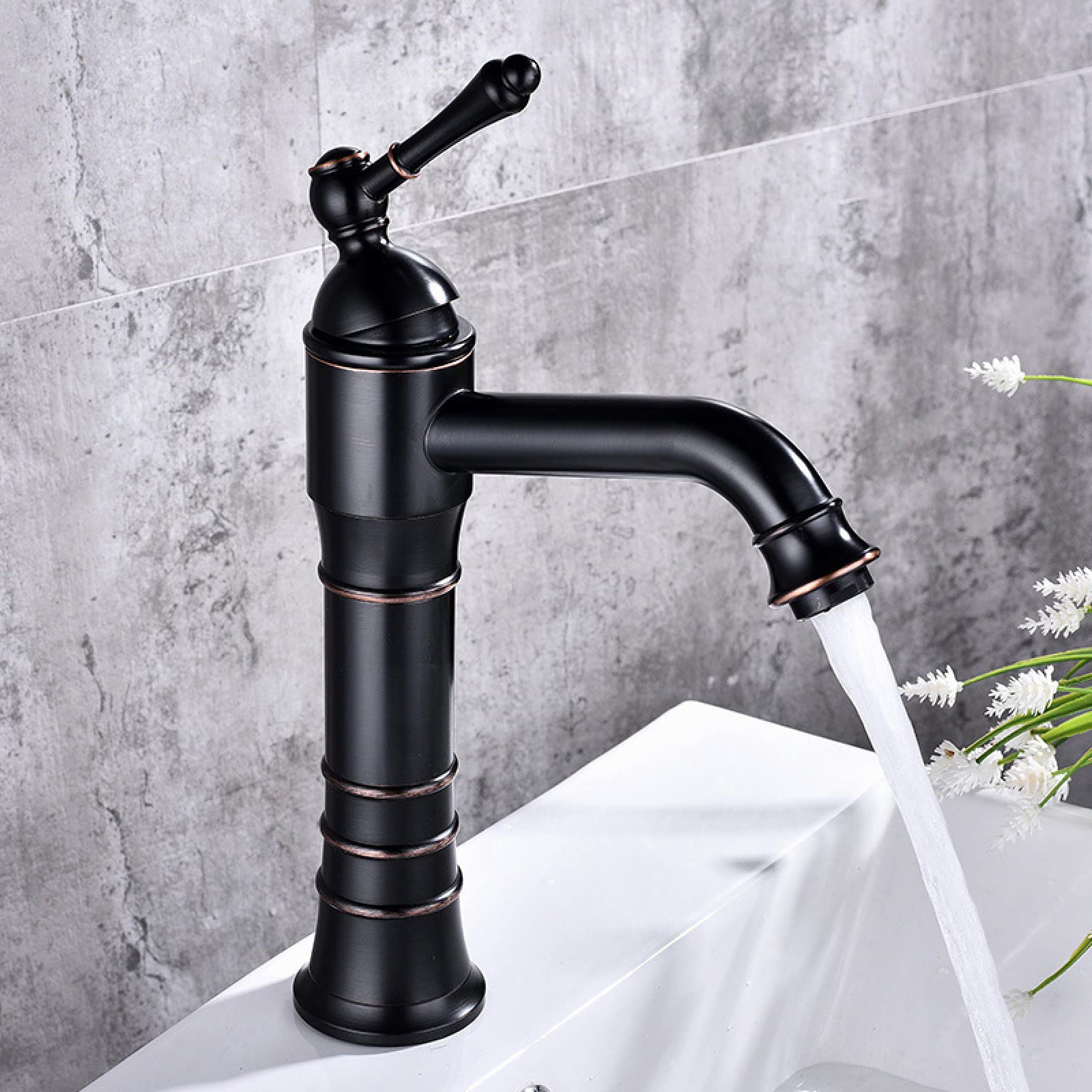 Grifo de baño giratorio de 360 negro para cuenca de agua caliente